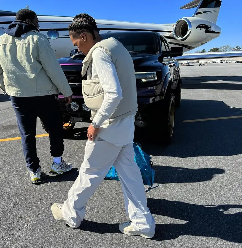 Lil Baby outfit in Post Archive Faction, Jordan, and Louis Vuitton, 2022
