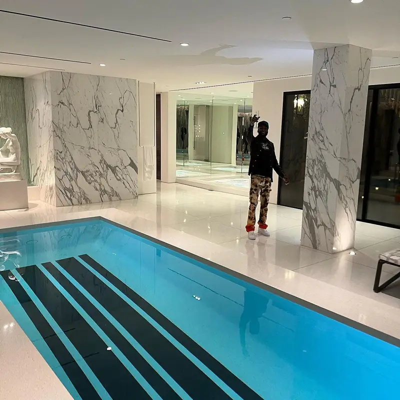 Meek Mill outfit in Mister Green, Amiri, and Nike, 2022