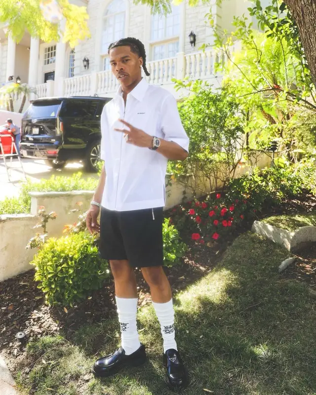 Lil Baby outfit in Givenchy, Prada, and Gucci, 2022
