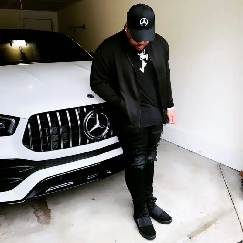 Jerry Production outfit in Louis Vuitton, Amiri, and Mercedes Benz, 2020