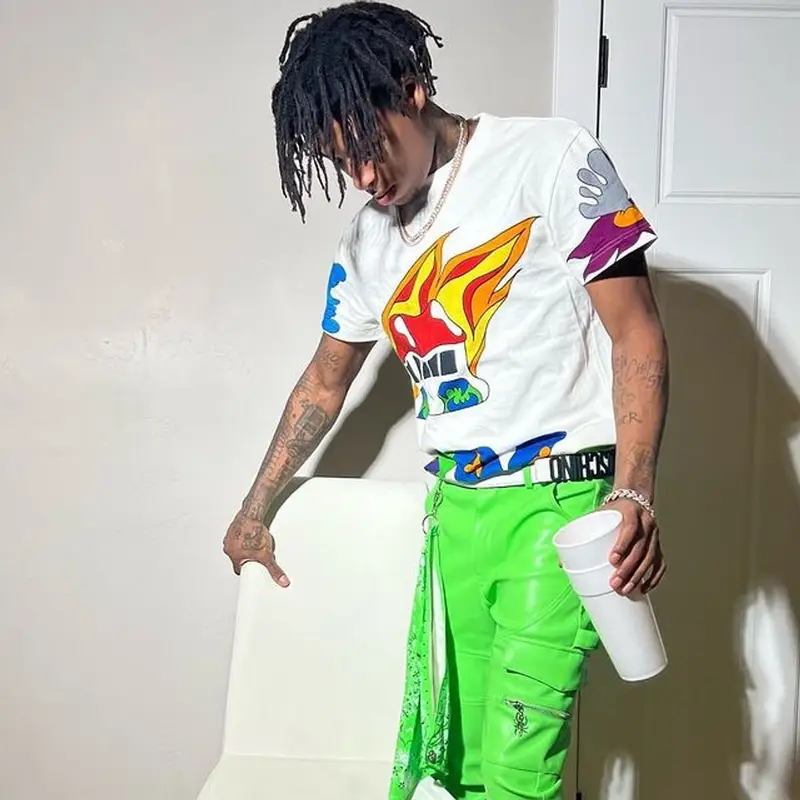 NBA YoungBoy outfit in Louis Vuitton, Guapi, and Moschino, 2022