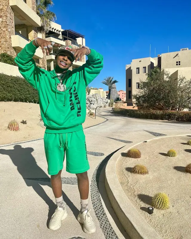 Toosii outfit in Helmut Lang and Gucci, 2022