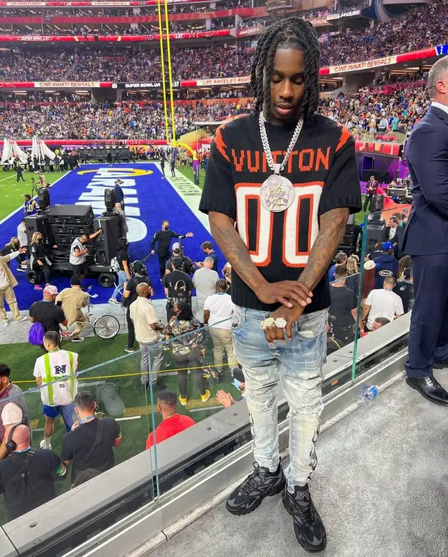 Polo G outfit in Louis Vuitton and Amiri, 2022