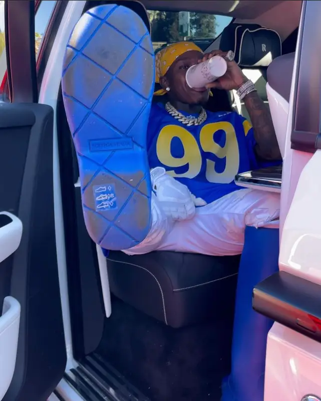 DaBaby outfit in Nike, Amiri, and NFL, 2022