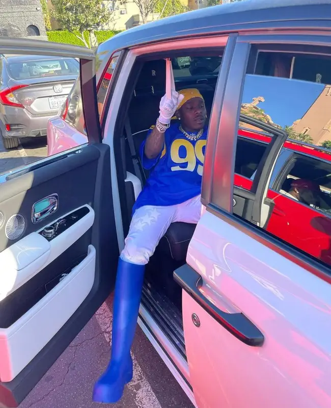 DaBaby outfit in Nike, Amiri, and NFL, 2022