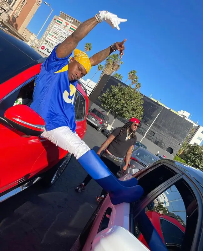 DaBaby outfit in Nike, Amiri, and NFL, 2022