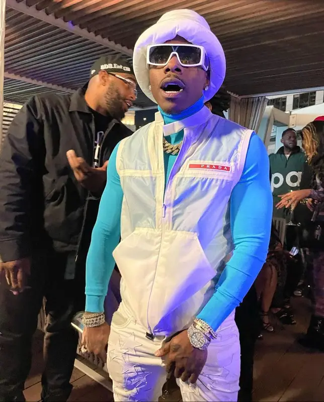DaBaby outfit in Prada, Amiri, and Louis Vuitton, 2022