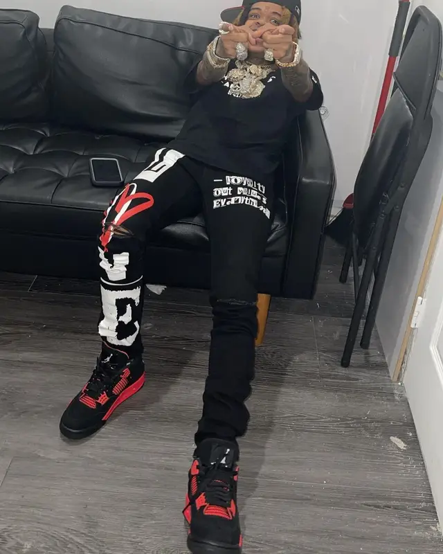SpotemGottem outfit in Bape, Jordan, and New Era, 2022