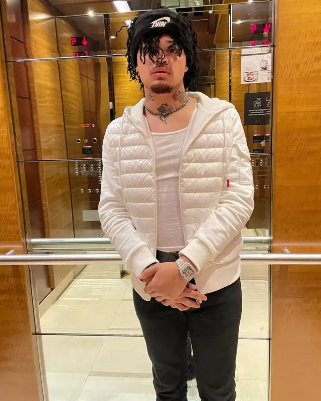 Summrs outfit in Moncler, Louis Vuitton, and Nike, 2022