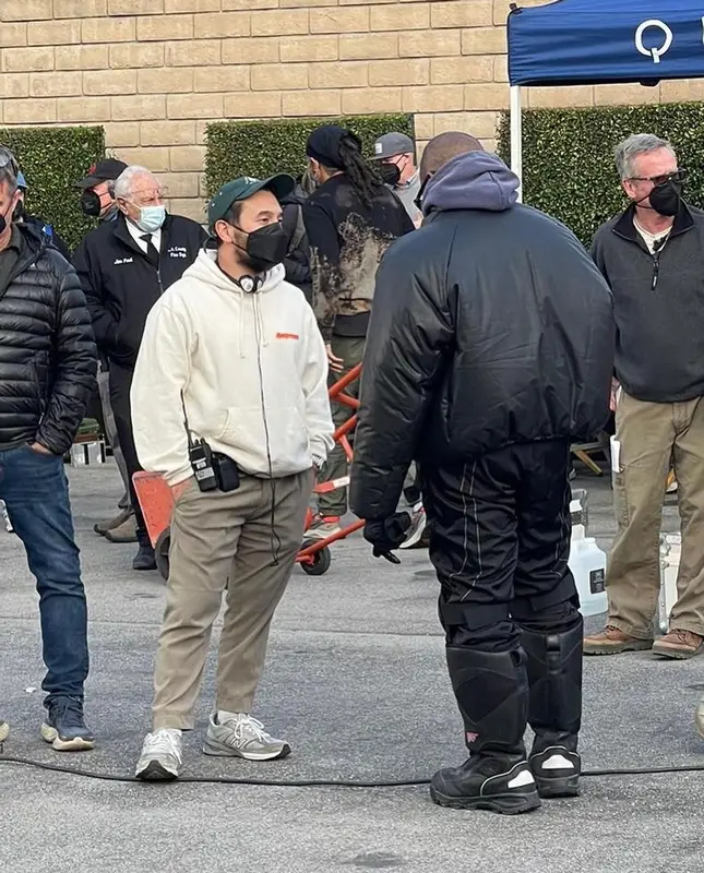 Kanye West outfit in Yeezy, GAP, and Illesteva, 2022