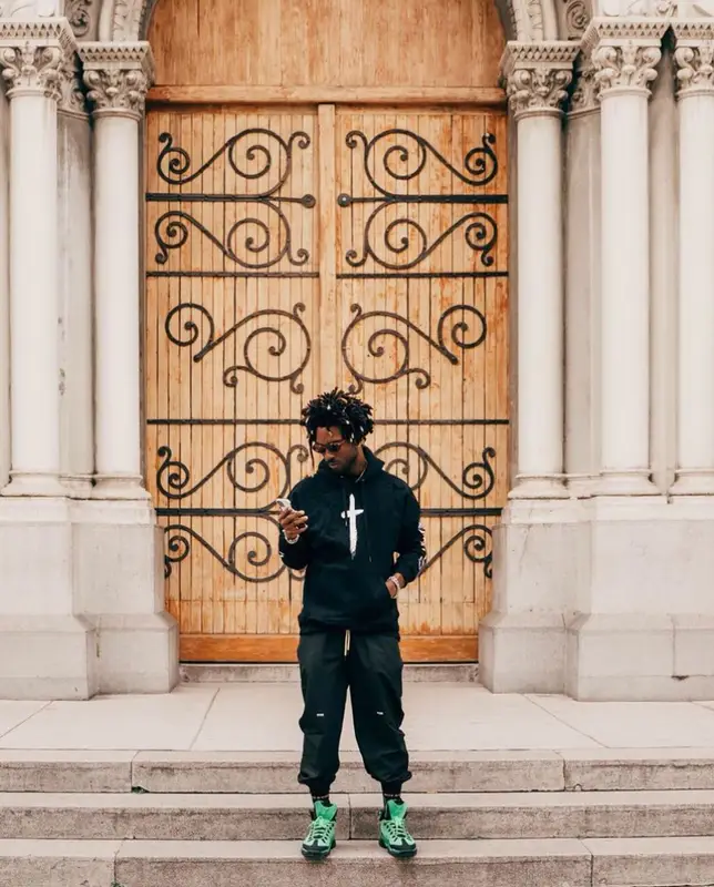 Saint JHN outfit in Christian Sex Club, Pyer Moss, and Louis Vuitton, 2022