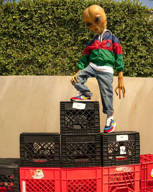 Lil Mayo outfit in Levi’s, Nike, and Sacai, 2021