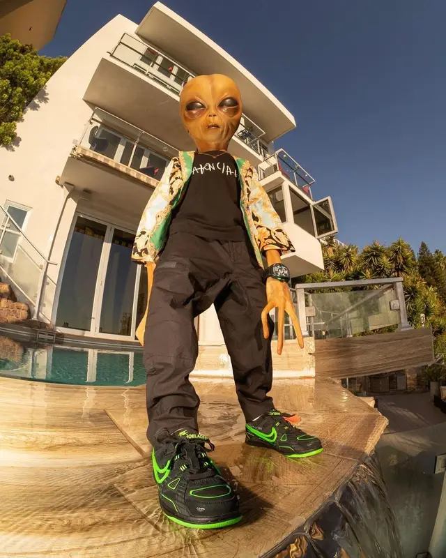 Lil Mayo outfit in Versace, Stone Island, and Nike, 2020