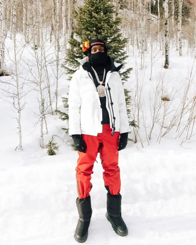 Polo G outfit in Canada Goose, Prada, and Oakley, 2022