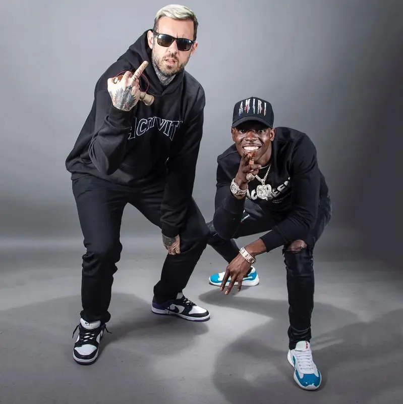 Adam22 outfit in Activity Clothing, Levi’s, and Ray-Ban, 2022