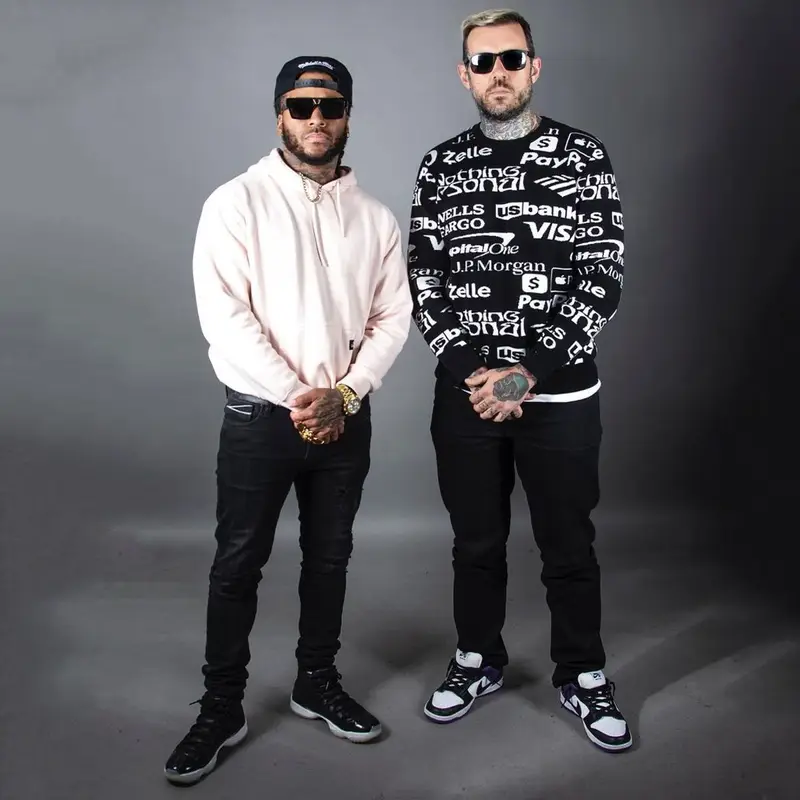Adam22 outfit in Levi’s, Nike, and Ray-Ban, 2022