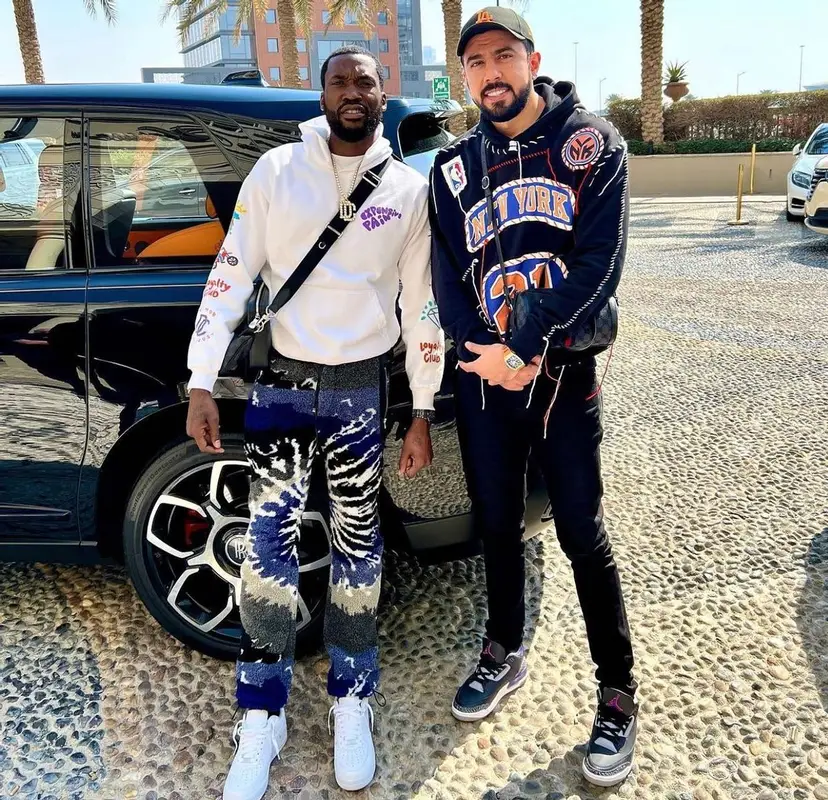 Meek Mill outfit in Amiri, Nike, and Louis Vuitton, 2022