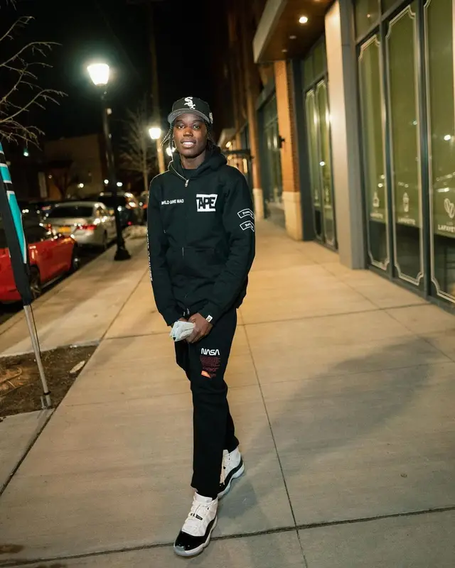Melvoni outfit in Bape, Heron Preston, and New Era, 2022