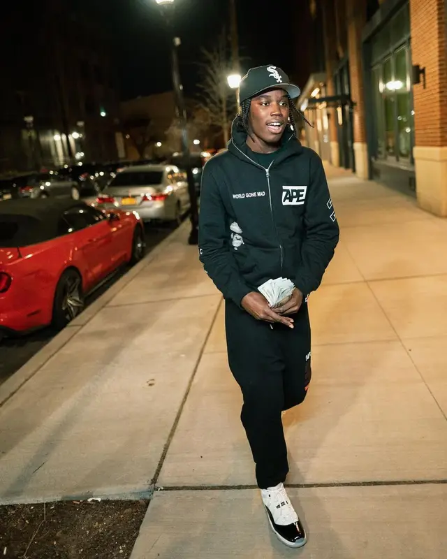 Melvoni outfit in Bape, Heron Preston, and New Era, 2022