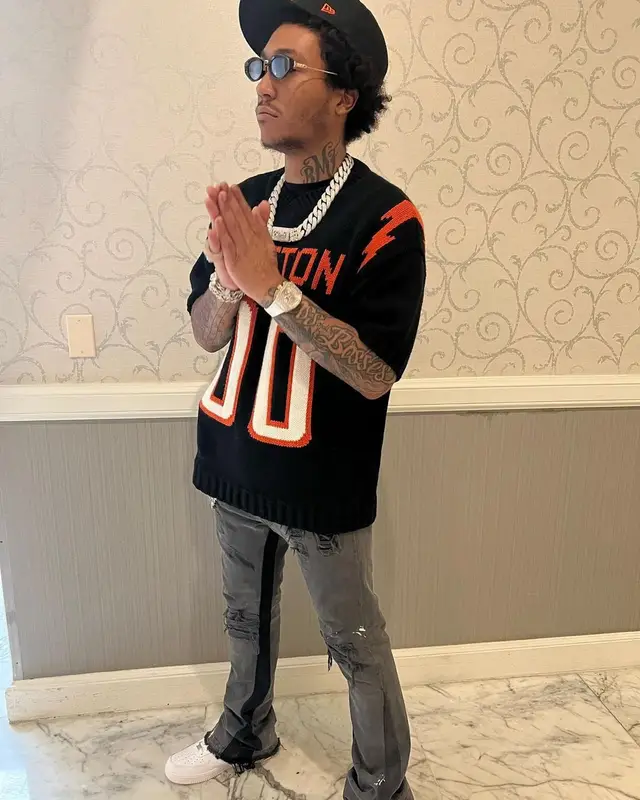 Lil Meech outfit in Louis Vuitton, Gallery Dept., and New Era, 2022