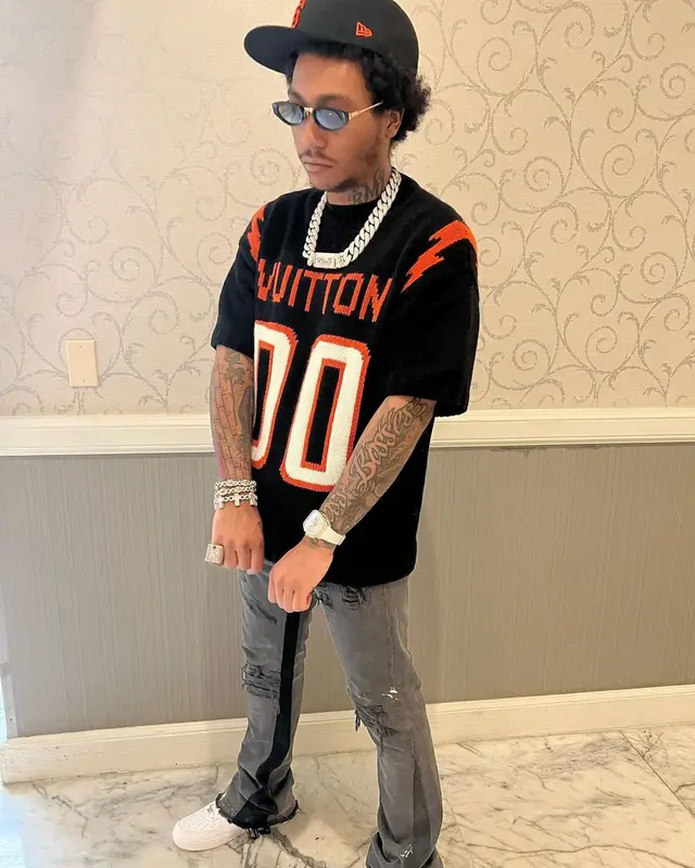 Lil Meech outfit in Louis Vuitton, Gallery Dept., and New Era, 2022