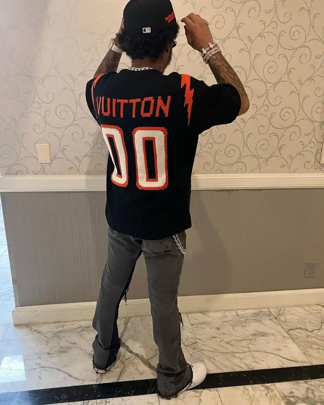 Lil Meech outfit in Louis Vuitton, Gallery Dept., and New Era, 2022