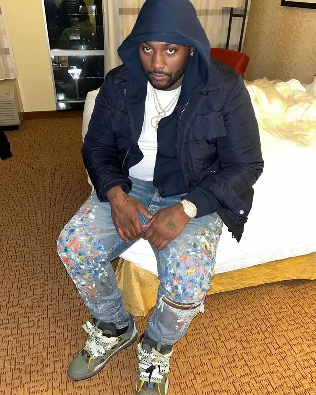 Peezy outfit in Louis Vuitton, Amiri, and Goyard, 2022