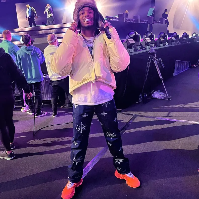 Quavo outfit in Louis Vuitton, Kapital, and Adidas, 2022