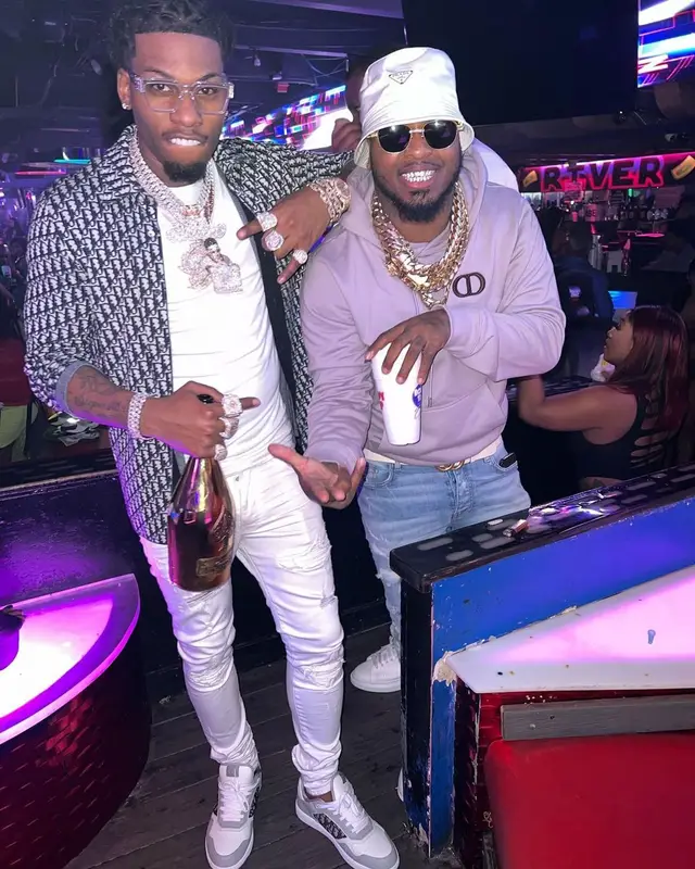Big Smooth outfit in Dior, Gucci, and Prada, 2022