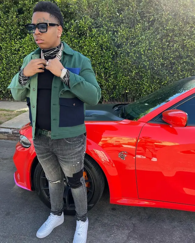Lil Gotit outfit in Zara, Purple Brand, and Dior, 2022