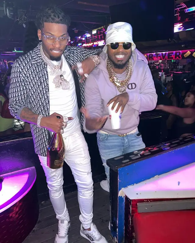 CJ So Cool outfit in Dior, Amiri, and Louis Vuitton, 2022