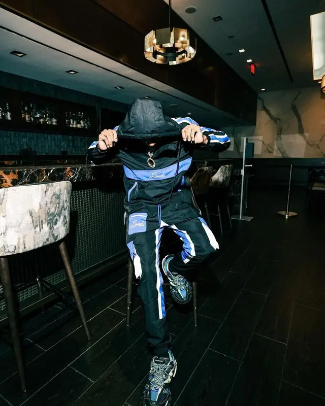 TJ Porter outfit in Everything Bandi and Balenciaga, 2022