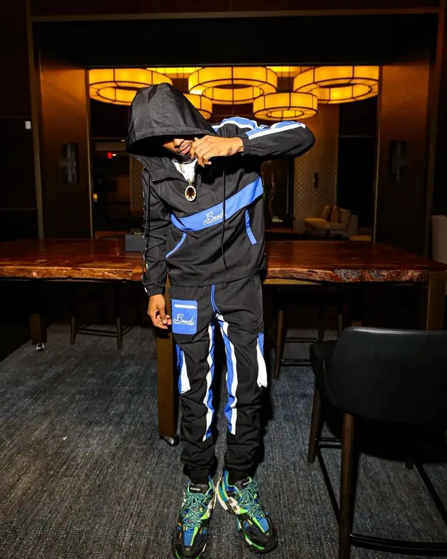 TJ Porter outfit in Everything Bandi and Balenciaga, 2022