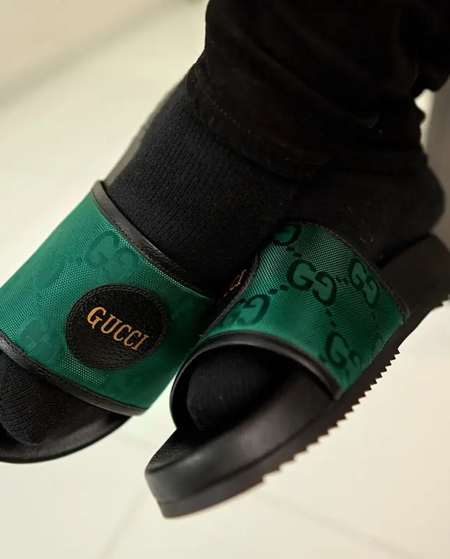 BandMan Kevo outfit in Gucci and Amiri, 2022