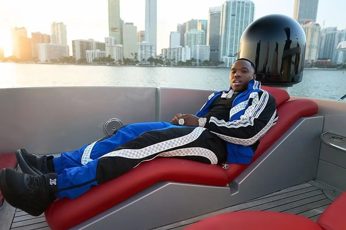 BandMan Kevo outfit in Louis Vuitton and Tom Ford, 2022