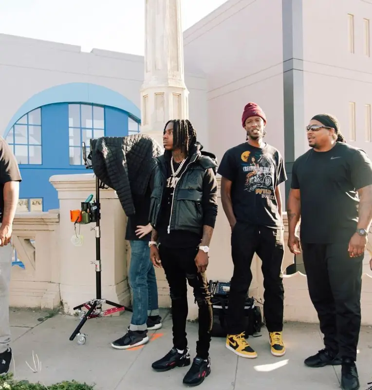 Polo G outfit in Amiri, Raf Simons, and Louis Vuitton, 2022
