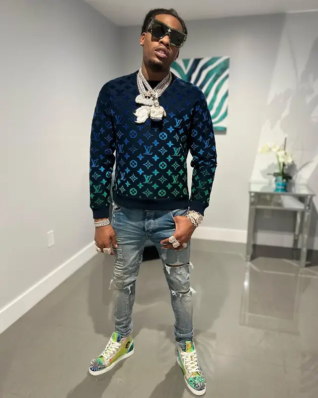 CJ So Cool outfit in Amiri, Christian Louboutin, and Louis Vuitton, 2022