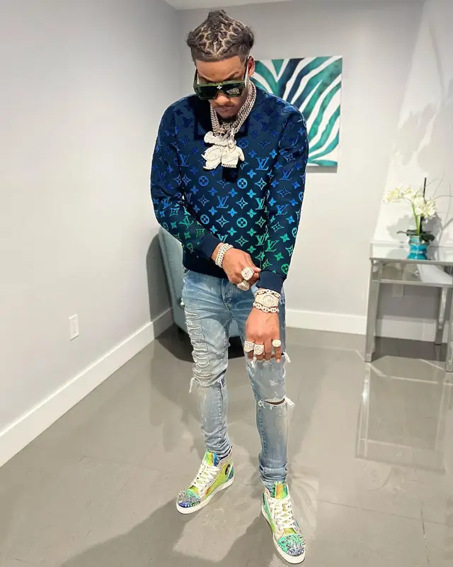 CJ So Cool outfit in Amiri, Christian Louboutin, and Louis Vuitton, 2022