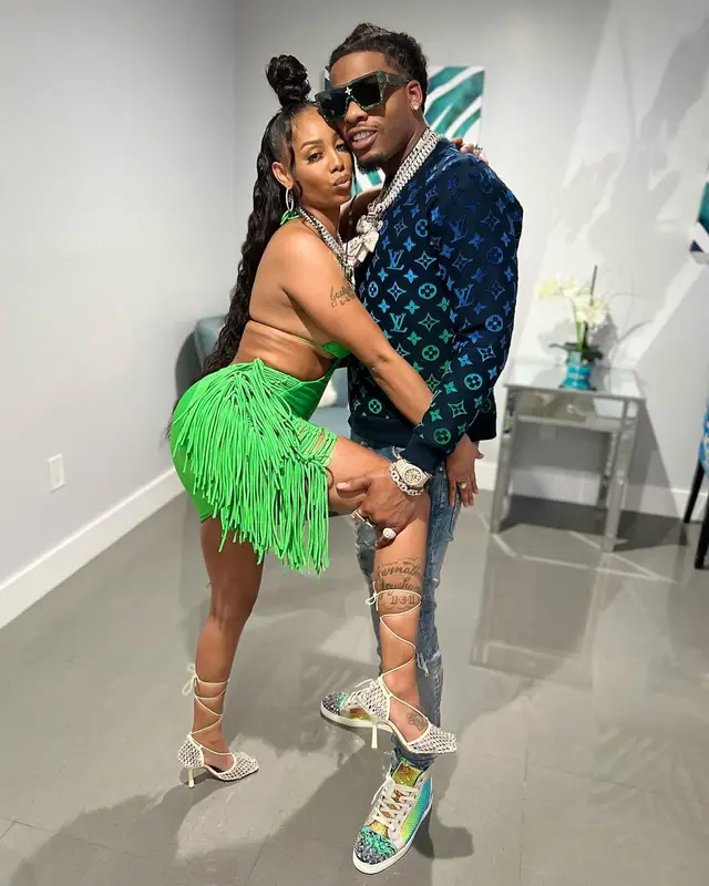 CJ So Cool outfit in Amiri, Christian Louboutin, and Louis Vuitton, 2022