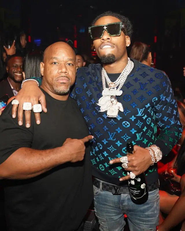 CJ So Cool outfit in Amiri, Christian Louboutin, and Louis Vuitton, 2022