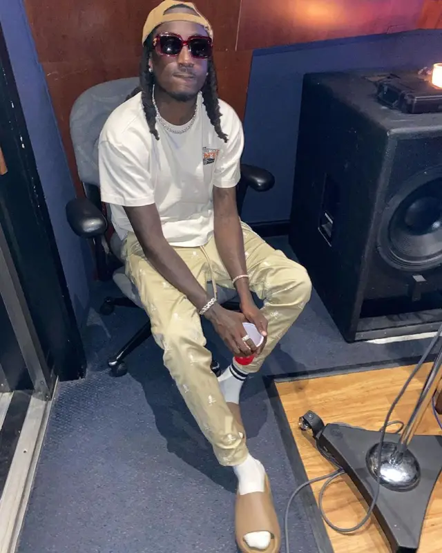 K Camp outfit in Mastermind, Versace, and Yeezy, 2021