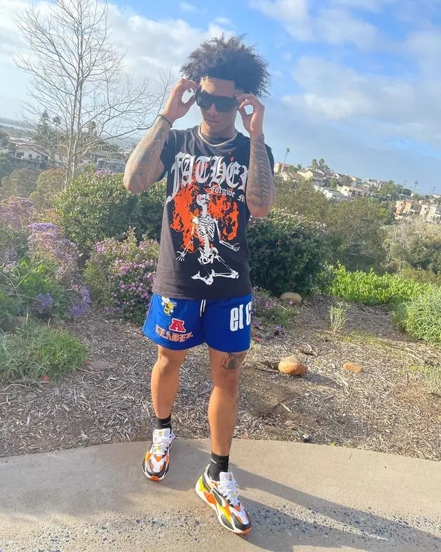 Mikey outfit in El Capitan Cartel, Puma, and Louis Vuitton, 2022