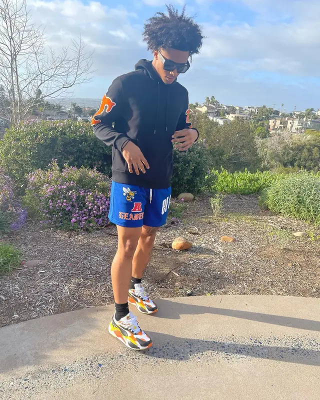 Mikey outfit in El Capitan Cartel, Puma, and Louis Vuitton, 2022