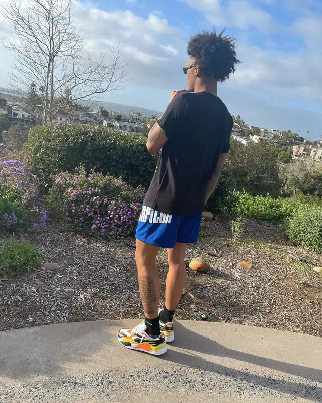 Mikey outfit in El Capitan Cartel, Puma, and Louis Vuitton, 2022