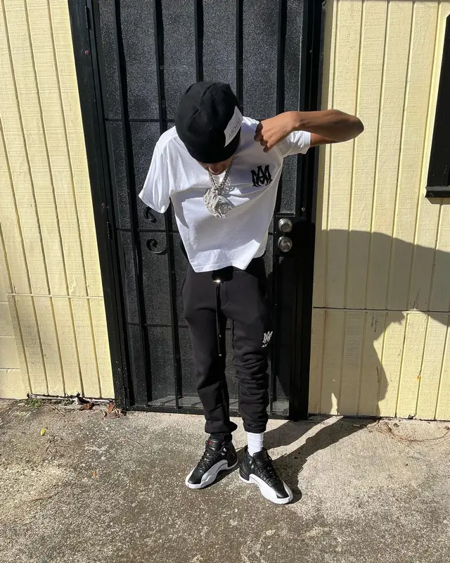 Nardo Wick outfit in Amiri, Jordan, and Palm Angels, 2022