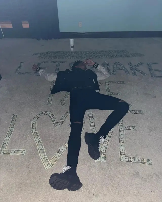 K Suave outfit in Amiri, Ksubi, and Alexander McQueen, 2022