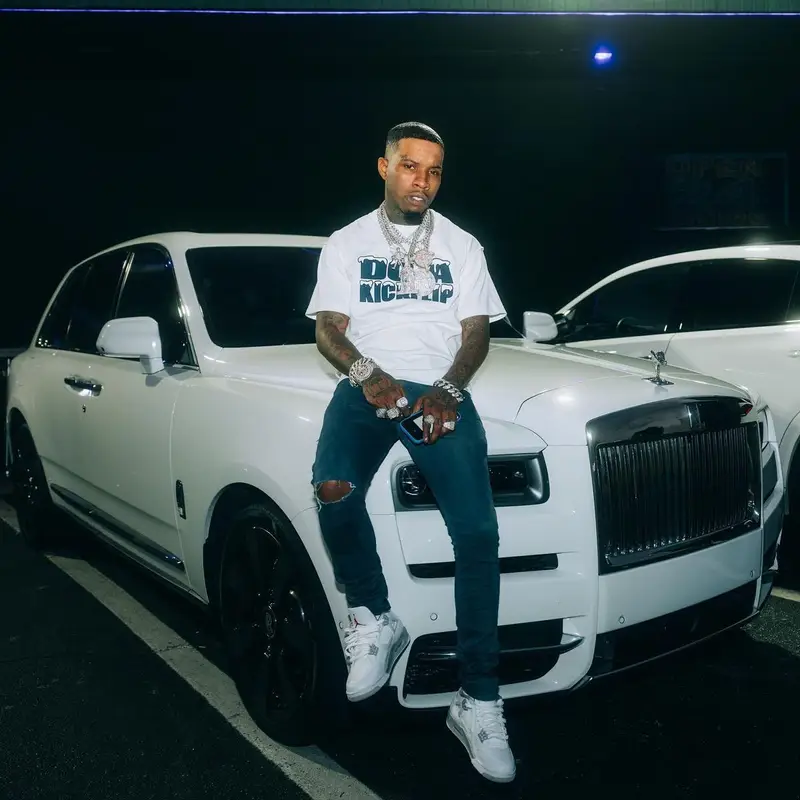 Tory Lanez outfit in Louis Vuitton, J Brand, and Jordan, 2022