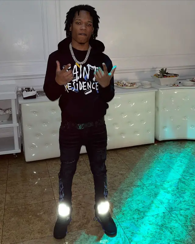 B Lovee outfit in Amiri, Jordan, and Louis Vuitton, 2022