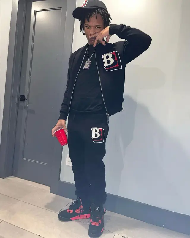 B Lovee outfit in Jordan and Burberry, 2022