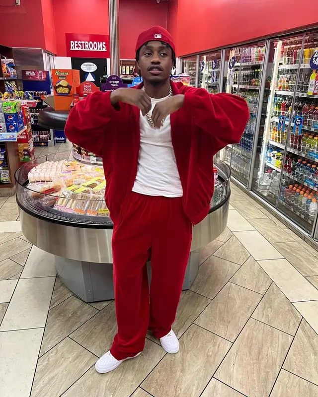 Lil Tjay outfit in Balenciaga, Nike, and New Era, 2022